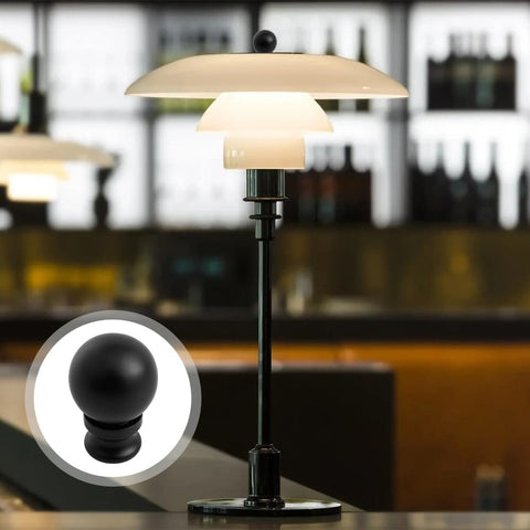 Two Pack Black Lamp Finials With Metal Knob Tops For Lampshades Screw Cap Nut Style Durable Die Cast Aluminum Minimalist Globe Design Decorative Replacement For DIY Table Or Floor Lamps shown installed on a modern table lamp.