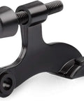Close-up of Super Sturdy Hinge Pin Door Stoppers 36 Pack Adjustable Wall Savers, black steel with rubber cushion, wall protector.
