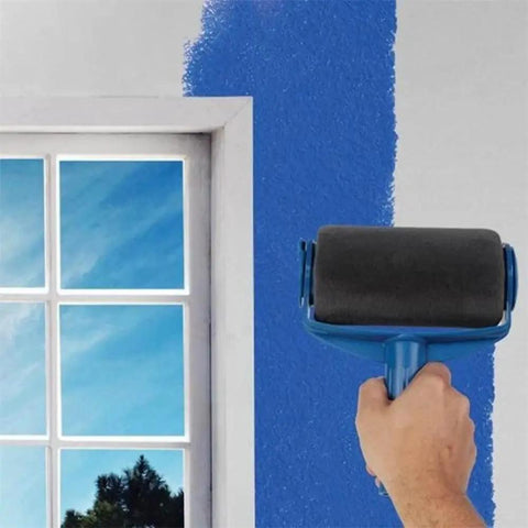 Super Slick Seamless Paint Roller Brush Kit With Flocked Wall Edger And Handy Glove painting blue wall next to window.
