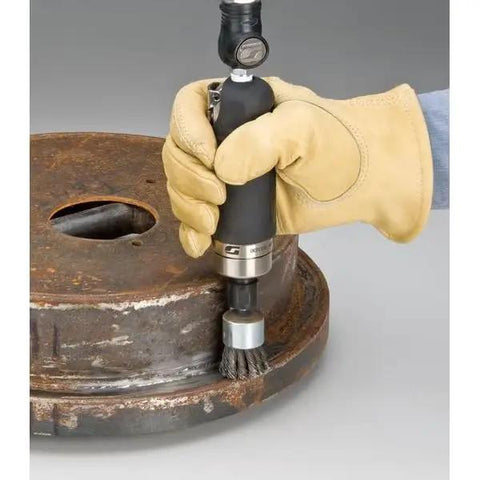 Zero Point Seven Horsepower Straight Line Die Grinder With Reinforced Steel Housing in use on a metal workpiece for surface finishing.