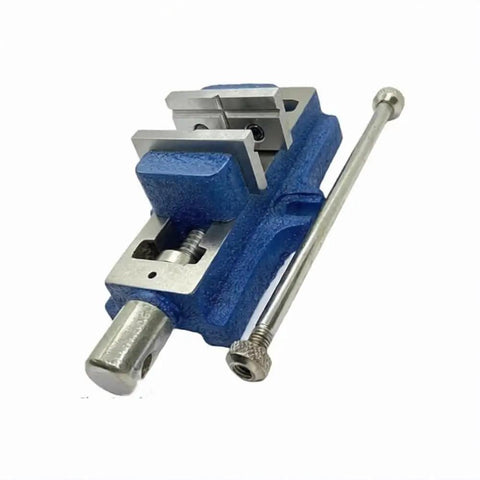 Heavy Duty Lathe Vertical Milling Slide With Tilt Swivel Base And Roomy 4 By 5 Inch Mounting Deck Built Like A Tank Out Of Solid Cast Iron Paired With A Rapid Action 2 Inch Self Centering Vise For Smooth Stock Removal Across The Local Machine Shop Floor