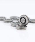 Get Your Hands On 10 Pc MF93 Flanged Ball Bearings For Mini Gearheads With 3mm Bore And 9mm Outer Diameter ABEC 3 Grade Open Design Perfect For High Speed DIY Projects And Industrial Gears Using Top Chrome Steel, showing flanged ball bearings on a white background.