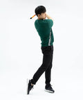 Man using Golf Swing Trainer Pro Indoor Practice Aid With MAX SPEED Stick and Speed Pointer at home