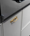 Champagne Bronze Cabinet Pulls With Escutcheon Backplates, Sleek 3 Inch Hole Center Modern Kitchen Drawer Handles, shown on cabinet