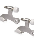 Front view of two brushed satin-nickel hinge-pin door stoppers with white rubber bumpers