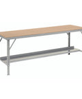 Rock Solid Heavy Duty Folding Workbench With 2000 Lb Capacity And Adjustable Height Legs For Garage Workshop Tasks Built Tough And Folds Flat For Tight Spaces No Sweat Setup Ready with a steel frame and hardboard top.