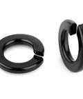 Two black finish 1/4-inch stainless steel split lock washers, front and side views.