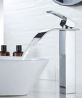 Vessel Sink Faucet Chrome Modern Tall Waterfall Style With Single Handle And One Hole Install For Vanity Bathroom RV Camper And Farmhouse Washroom Dope Splash Free Water Saving Lavatory Faucet, installed on a white sink in a modern bathroom.