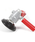 4-inch pneumatic grinder with red textured handle and black polishing pad for stone polishing