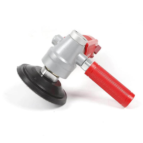 4-inch pneumatic grinder with red textured handle and black polishing pad for stone polishing