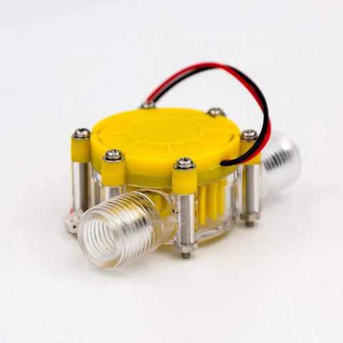 Front view of a Water Turbine Micro Hydroelectric Power Generator For DIY Off Grid Charging LED Lighting And Devices DC Up To Eighty Volts Ten Watt Output No Internal Regulator Great For Charging Small Batteries And Phones, with a yellow cap and two clear connectors.