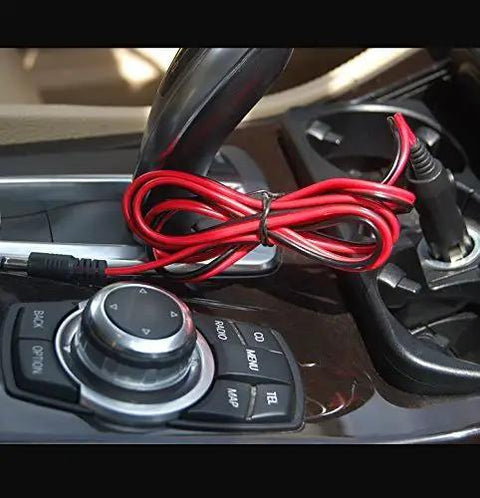 Heavy Duty 12 To 24 Volt Car Charger Cable With Dual DC Plug Sizes For Five Point Five By Two Point One Millimeter And Four Point Zero By One Point Seven Millimeter To Car Cigarette Lighter Male Plug LED Indicator Four Foot Cord And Three Amp Fuse connected in car.