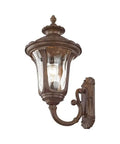 Oxford Style 1 Light Imperial Bronze Cast Aluminum Wall Lantern With Amber Water Glass installed against white background