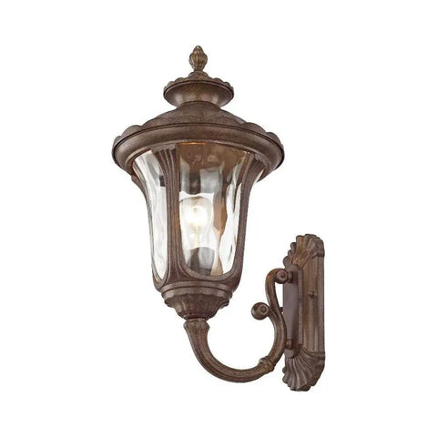 Oxford Style 1 Light Imperial Bronze Cast Aluminum Wall Lantern With Amber Water Glass installed against white background