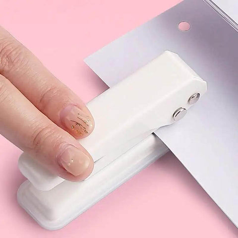 Using Heavy Duty Single Hole Puncher With One Quarter Inch Hole Twenty Sheet Capacity Metal Construction Skid Resistant Base