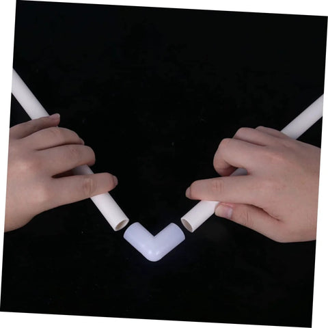 LABRIMP balloon stand kit: white plastic tubes with pastel blue elbow connector; hands assembling