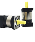 Nema 23 Planetary Gear Reducer And Worm Gearbox For 200 Watt 400 Watt Servo Motors with steel housing and yellow input shaft.