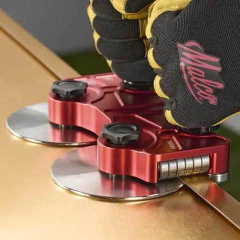 Pro Grade 2 Station Metal Bender Disc FS2DL in use on metallic sheet for straight bends