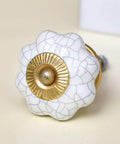Top Tier White Ceramic Pumpkin Drawer Knobs 100 Pack Crackled Finish Slick Cabinet Hardware For Kitchen Cabinets And Dressers Hassle Free Install Classy Home Refresh Upgrade close-up view with golden center detail.