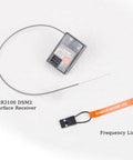 SR3100 2.4GHz DSM2 3 Channel Surface Receiver with frequency line for DX3R DX4C DX5C transmitters, top view on white background