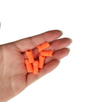 Hand holding orange Half Moon Arrow Nocks 50 Pack Plastic Crossbow Nocks For 7.6mm ID Bolts Orange Replacement Tips For Target Practice