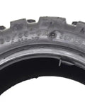 Close-up of Heavy Duty Off Road Vacuum Tubeless Tire 90 65 6.5 Replacement For Motorcycles And Electric Skateboards