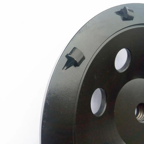Close-up of 7 Inch PCD Grinding Wheel With 9 Segments For Removing Epoxy, Glue, Mastic, Paint And Concrete Floor Coatings 5/8-11 Thread