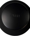Close-up of Heavy Duty Tip Toe Bathtub Drain Plug With One Hole Overflow Cap Oil Rubbed Bronze Finish, top view with 'PUSH' label.