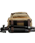 Back view of Canvas Batik Camera Backpack Waterproof And Wear Resistant Ultra Large Capacity Gear Bag For Photogs with attached tripod.