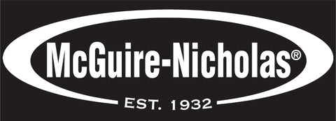 McGuire-Nicholas logo with "EST. 1932" text in white on a black background.