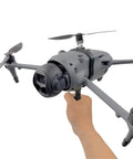 Hand holding DJI Mavic 4 Pro Handheld Holder Takeoff Landing Mount For Mavic 4 Pro Drone Seamless One Take Aerial To Ground Shooting Bracket
