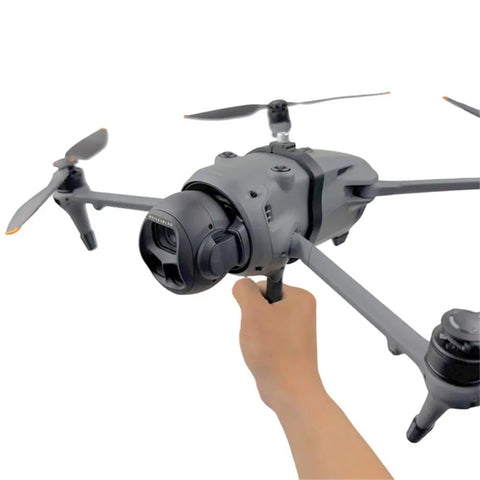 Hand holding DJI Mavic 4 Pro Handheld Holder Takeoff Landing Mount For Mavic 4 Pro Drone Seamless One Take Aerial To Ground Shooting Bracket
