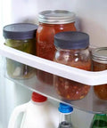 Awesome Leak Proof Plastic Lids for Wide Mouth Mason Jars, BPA Free, on jars in a fridge