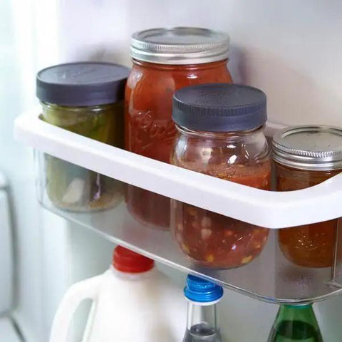 Awesome Leak Proof Plastic Lids for Wide Mouth Mason Jars, BPA Free, on jars in a fridge