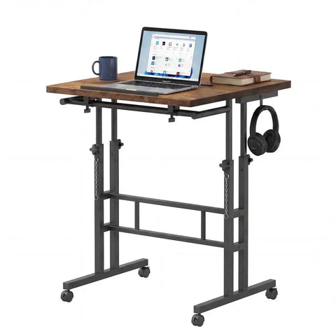 Mobile Split-Top Sit Stand Desk With Nifty Cup Holder, Smooth-As-Butter Manual Height Adjustment Knobs, Ergonomic Workstation For Killer Posture, Easy Transition Between Sitting And Standing Zero Hassle Setup For Home Office with laptop, cup, and books.