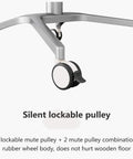 Game Changer Height Adjustable Standing Desk With Silky Gas Lift And Ultra Quiet Lockable Rubber Wheels showing silent lockable rubber wheels.