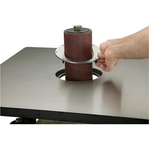 Powerful One Horsepower Oscillating Spindle Sander featuring rock solid cast iron table with sanding drum adjustment.