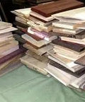 Stacks of Box Of Long Thin Unfinished Craft Wood Scraps In Multiple Species 24 Inch Long Boards Kiln Dried Some Sanded Some Not