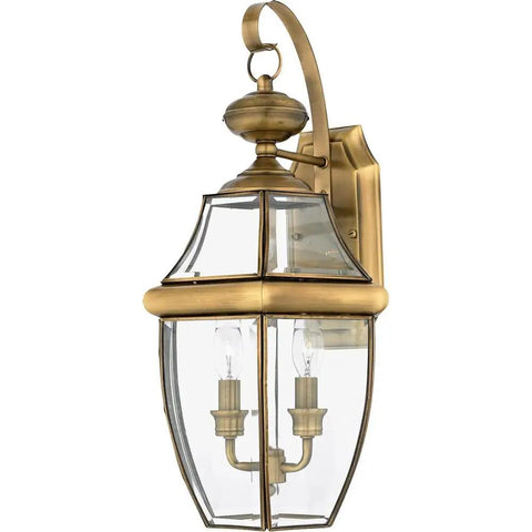 Two Light Outdoor Wall Lantern In Antique Brass Finish For Patio And Entry, Classic Newbury Style Mount Light shown from side angle
