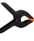 Six Pack 9 Inch Hefty Spring Clamps Made From Tough Nylon With Cushioned Jaw Tips Engineered For Knockout Grip Efficiency And Quick Swaps On Woodworking Or Photo Studio Crafting Sessions - close-up angle of a single clamp