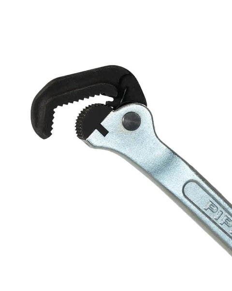 Close-up of Badass Slim Pipe Wrench Built For Tight Squeezes And Overhead Runs with forged steel jaws gripping a pipe.