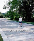 Superior Heavy Duty One Step Concrete Sealer And Curing Compound With Deep Penetrating Internal Moisture Vapor Barrier For Natural Stone And Cultured Rock Hella Tough Zero Hassle Protection applied to a finished driveway.