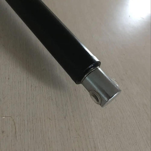 Close-up of Heavy Duty 12V And 24V Linear Actuator with 20 Inch Stroke tip, showcasing metal connector detail.