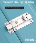 Heavy Duty Stainless Steel Gate Latch Rock Solid Sliding Spring Barrel Bolt With Brass Push Button smooth latch on blue surface