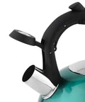Close-up of a stainless steel whistling tea kettle with ergonomic handle, teal color, 2.3 liter capacity, ideal for fast boil and daily use.