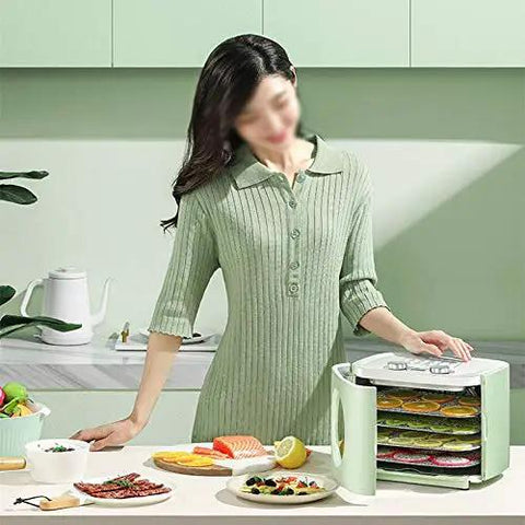 Electric Food Dehydrator With Badass Stainless Steel Trays And Sick 360 Hot Air Circulation For Dried Fruit Veggies And Beef Jerky on kitchen counter with food.