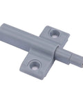 Close-up view of a gray ABS plastic silent push open cabinet door catch from the Ten Pack Silent Push Open Cabinet Door Catches With Sticky Bumpers To Keep Kitchen Cupboards Wardrobes And Drawers Closed Without Noise Or Hardware Damage For A Super Clean Modern Look.