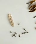 Eight Pack Copper Self Closing Pivot Door Hinges With Concealed Top And Bottom Design screws and tools on white background