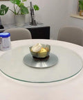 Kickass Heavy Duty Lazy Susan Turntable With Thick Tempered Glass Top and Stainless Steel Bearings for Dining Table with fruit bowl.