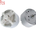 Dope Little Mini DC Motor Pack Of 2 Runs On 1.5 To 5 Volts, 2700 RPM, 32mm Diameter, shown with exposed gears and shaft